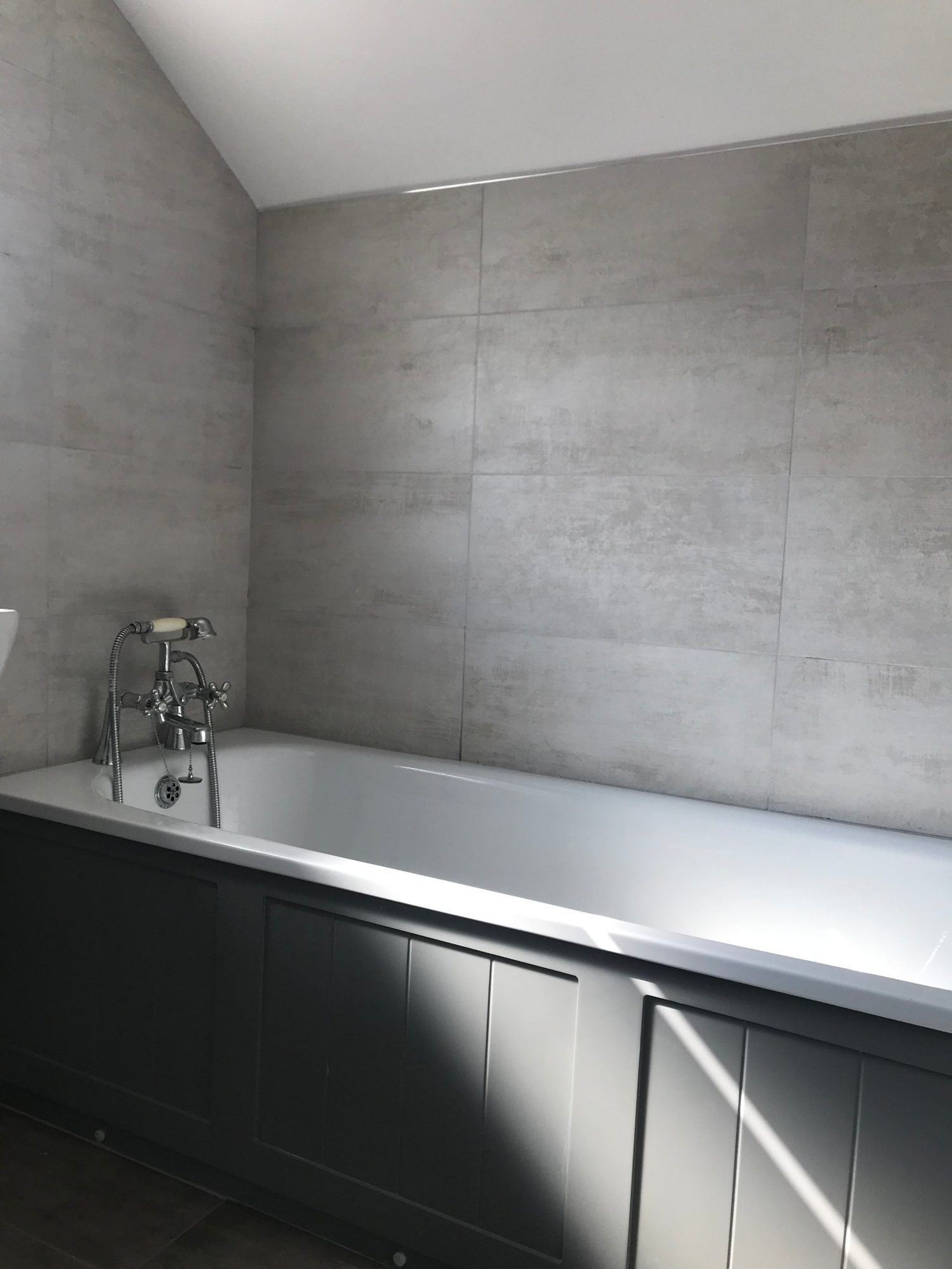 Bathroom tiling in Gloucestershire by Camms Bathrooms