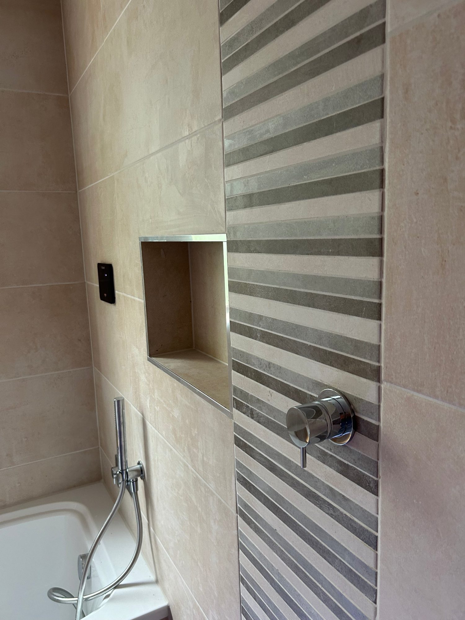 Bathroom tiling in Gloucestershire by Camms Bathrooms